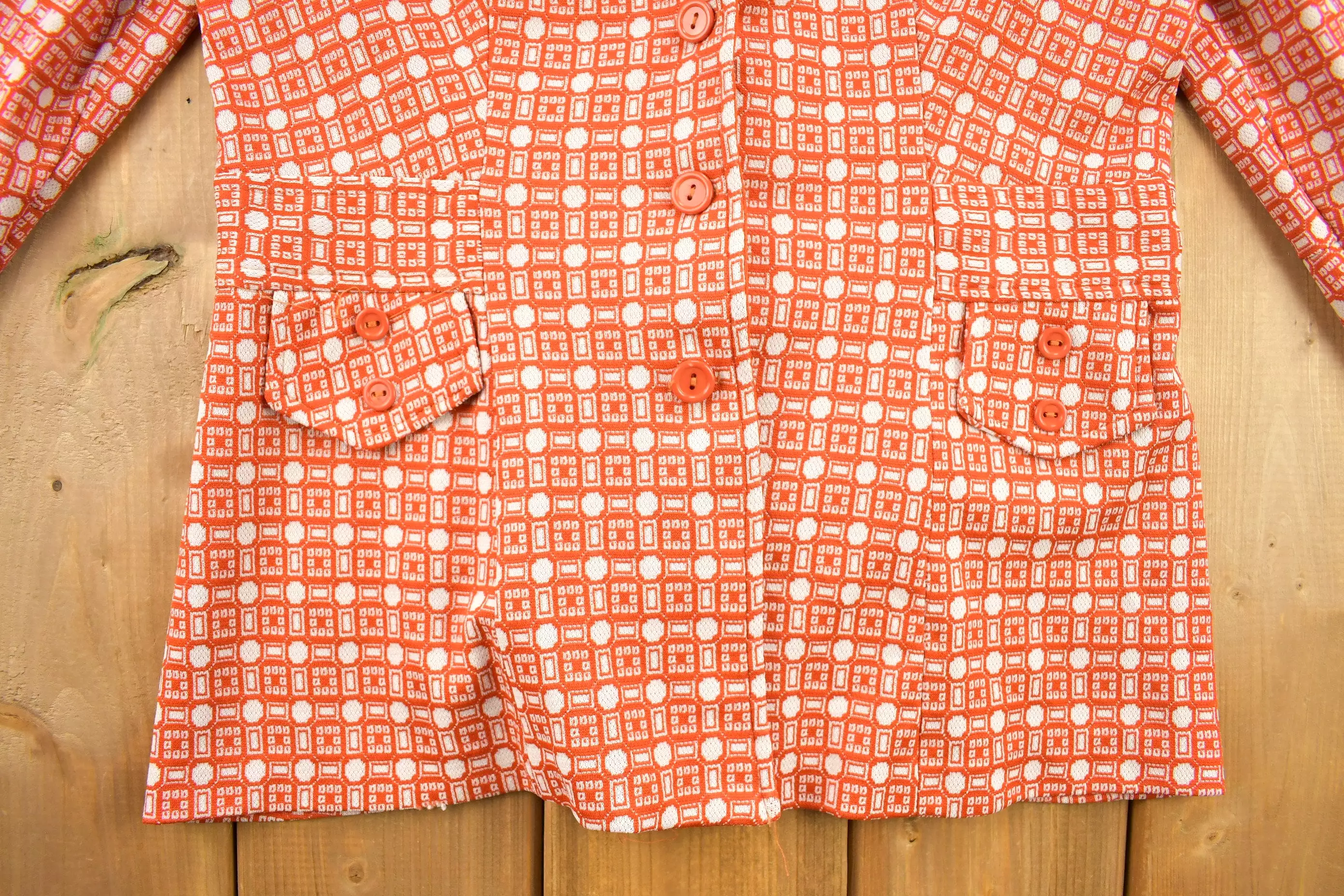 1960s Retro Womenswear: Orange Geo Metric Pattern Overcoat/Blouse with Dagger Collar