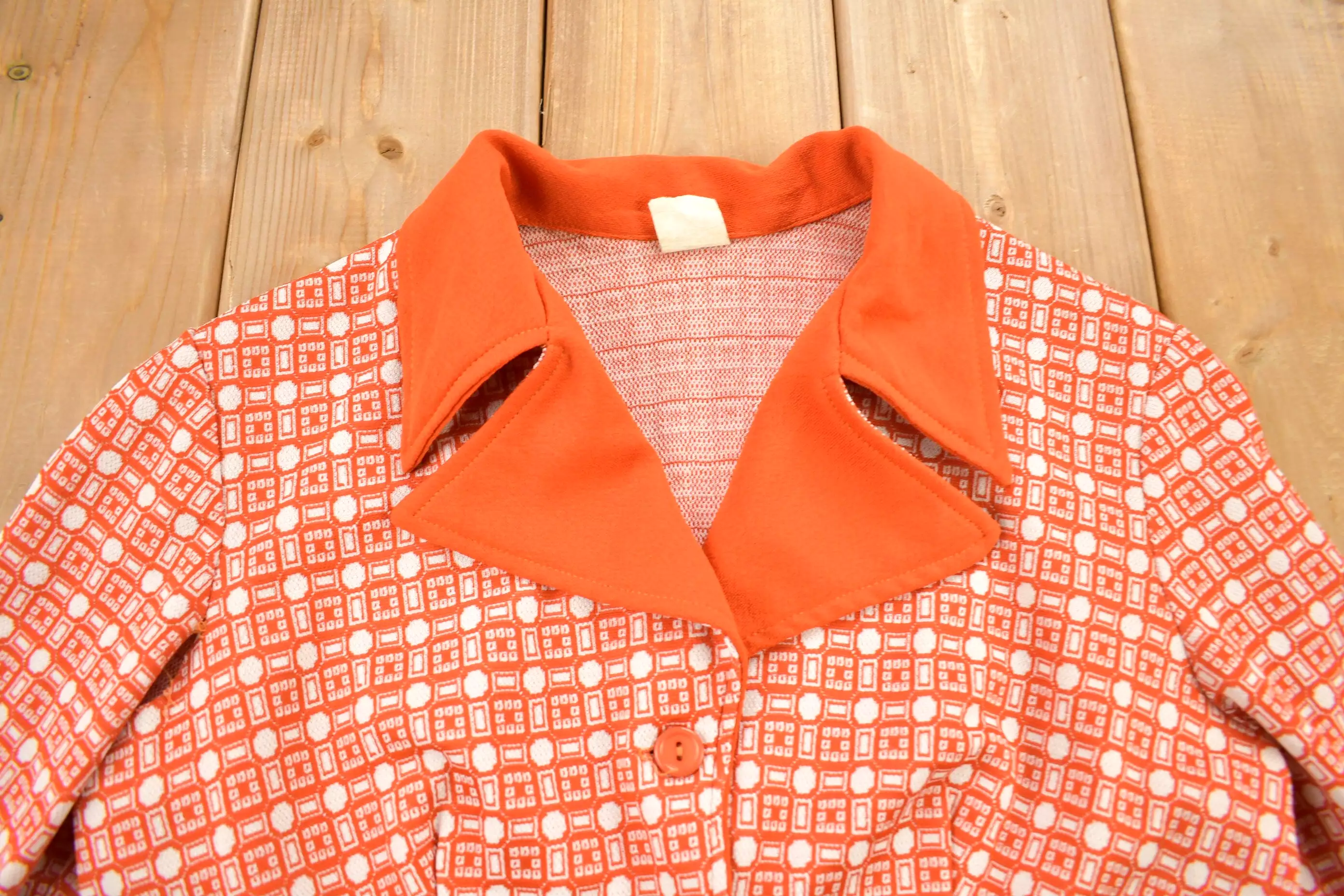 1960s Retro Womenswear: Orange Geo Metric Pattern Overcoat/Blouse with Dagger Collar