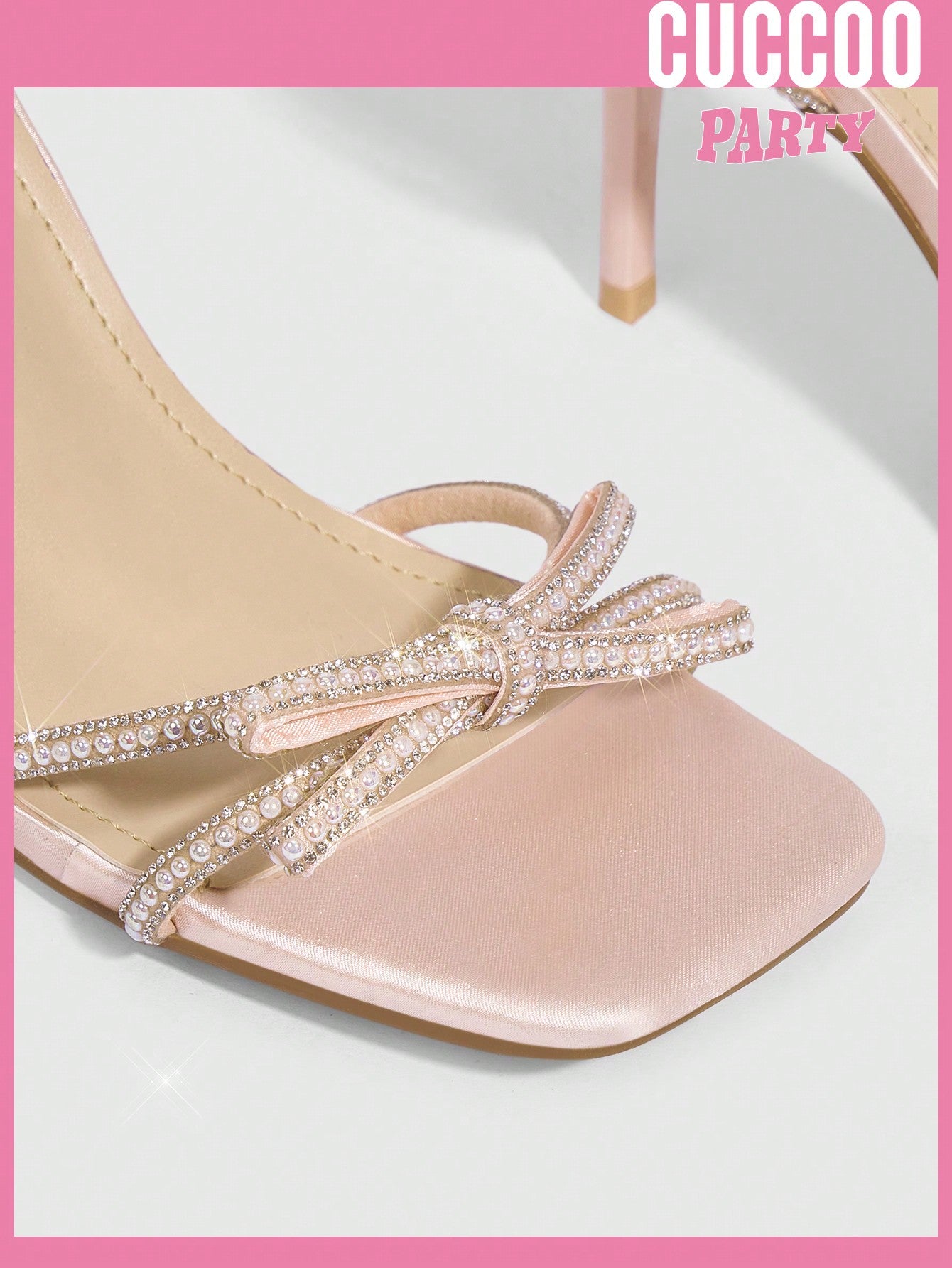 Fashionable high heel sandals with pearl detailing, rhinestone embellishments, and bowknot, ideal for spring and summer.