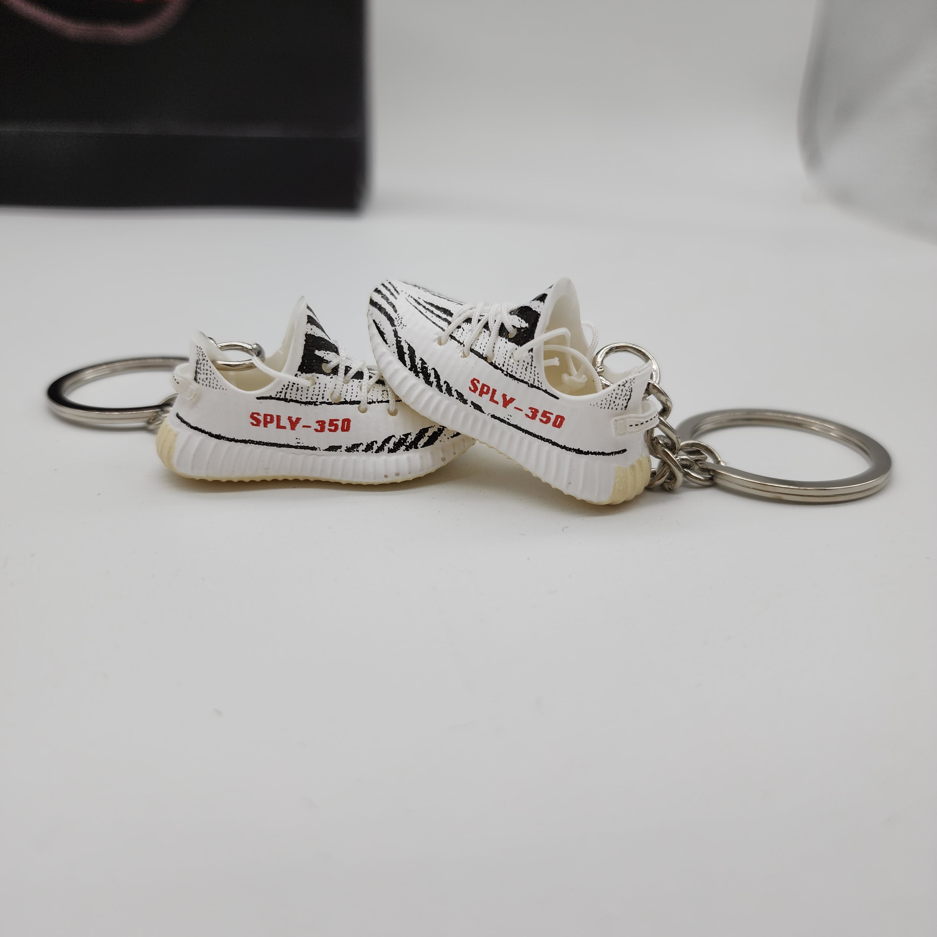 Mini Yeezy Sneaker Keyring - White/Black - Buy Now.