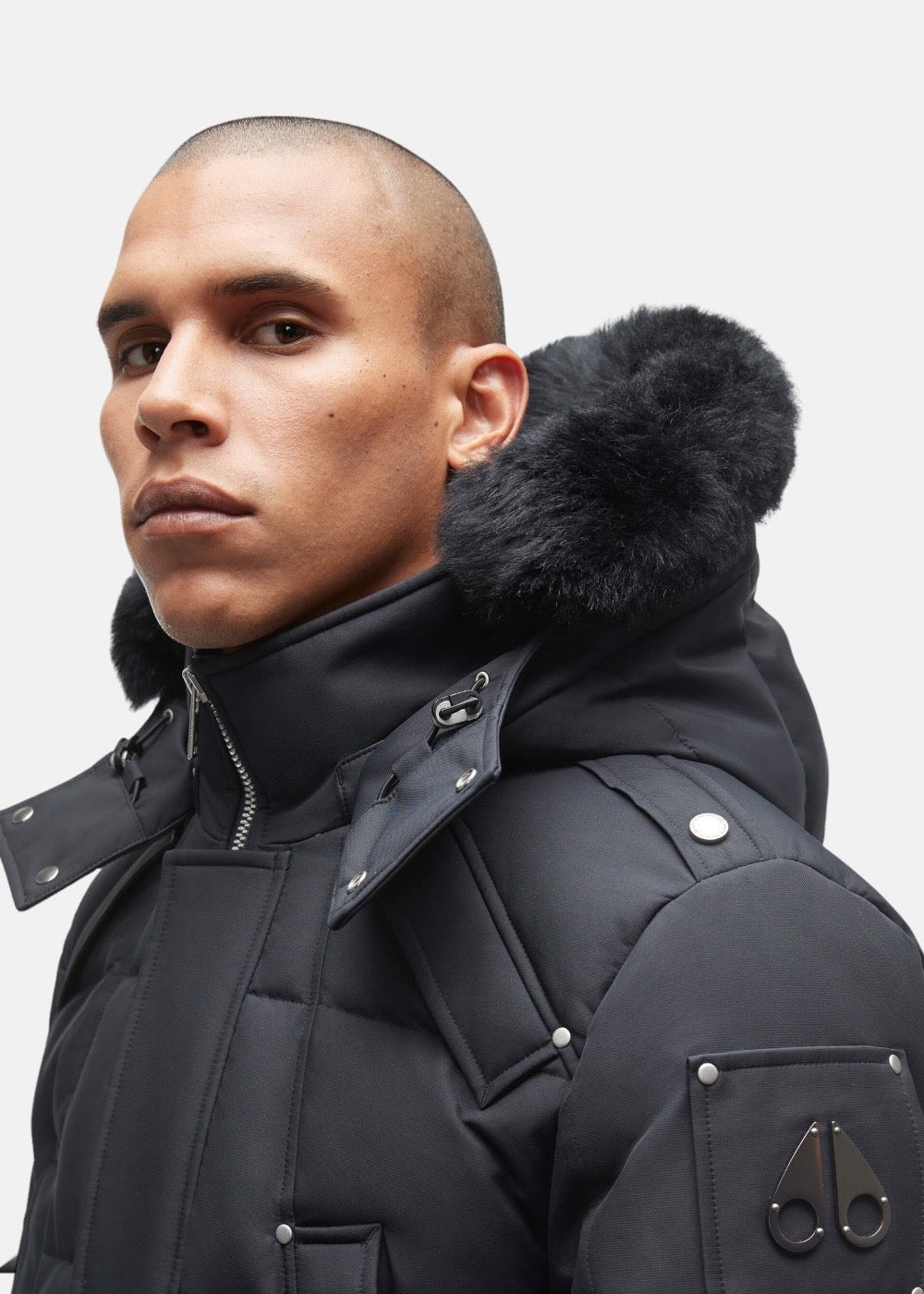 Moose Knuckles Black Cloud parka with black fur.