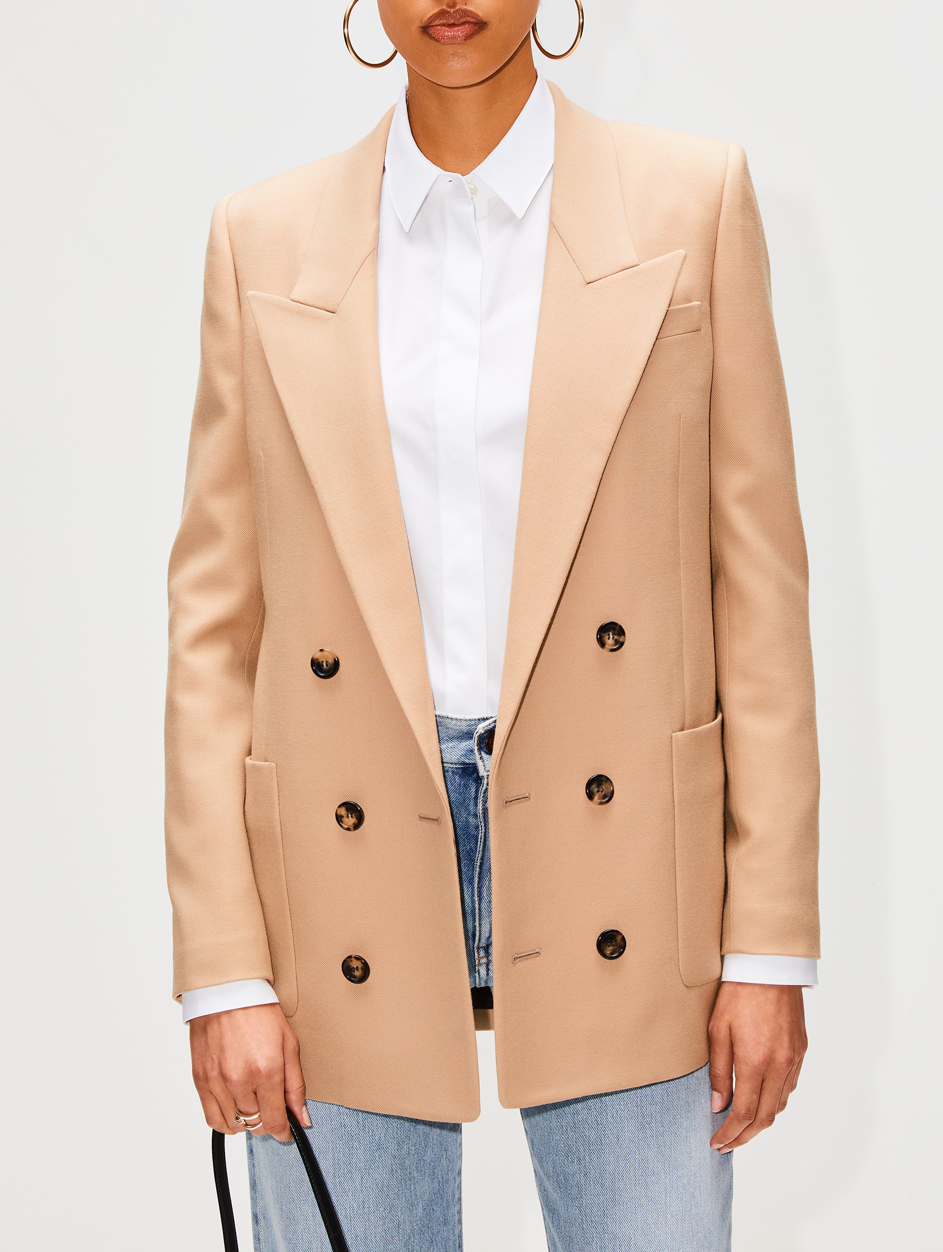 The search result for Double Breasted Jacket is a formal style jacket with overlapping front flaps that are fastened with button